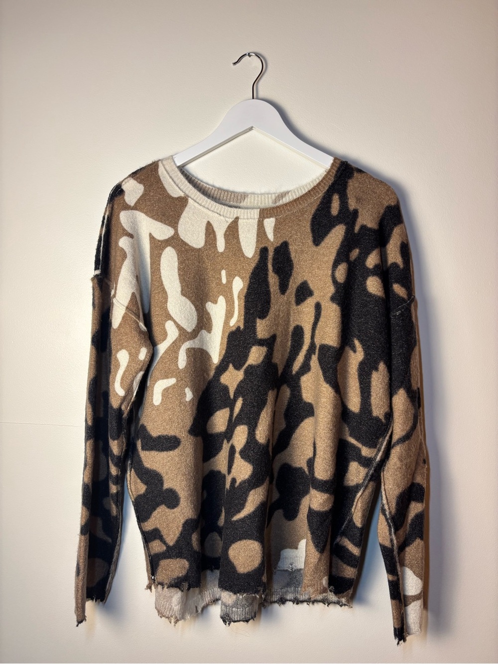 Women’s sweater, tan, black and cream.  No size listed.